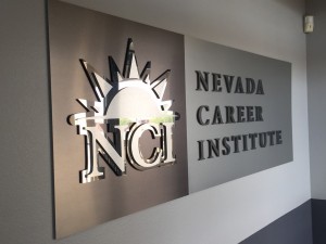 NCI-acrylic lobby logo panel with mixed metal laminate