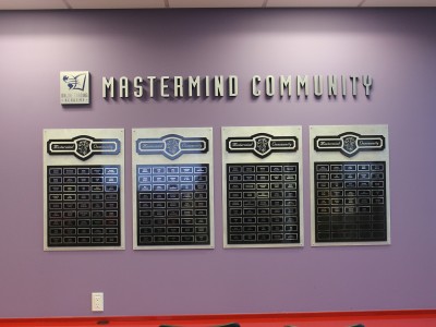 Online-Trading-Academy-Mastermind-Community-Layered-wall-display-with-acrylic-and-metal-laminate